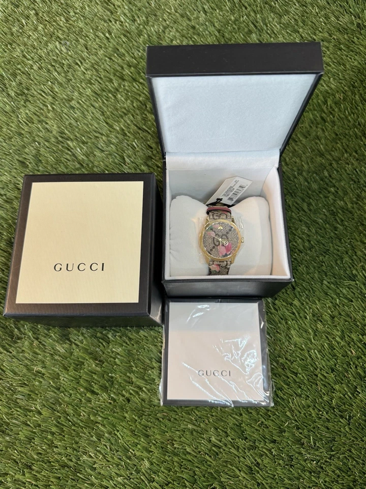 Reloj con correa de lona Gucci G-Timeless rosa flor para dama YA1264038A Foto 2 de 4
