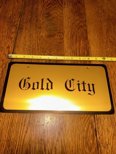 Vintage Steel   “ GOLD CITY“   License Plate Accessory Novelty Booster (NOS) - Picture 1 of 19