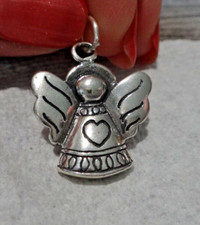 Sterling Silver 22x19mm Detailed Angel with a Heart Charm