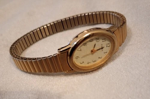 Vintage Timex Ladies Gold Tone Oval Face Bracelet Watch, Late '80s Early 90s Era