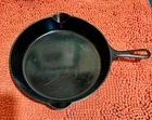Ca. 1940s Griswold  #10 cast iron 12-inch skillet, lies flat on any range burner