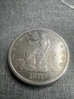 1877 s trade dollar. AU++