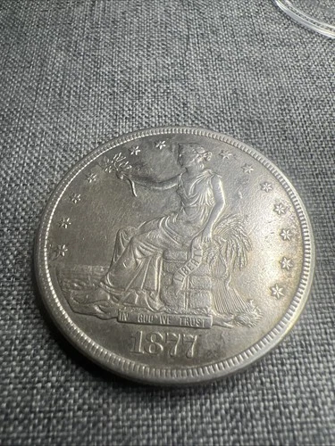 1877 s trade dollar. AU++