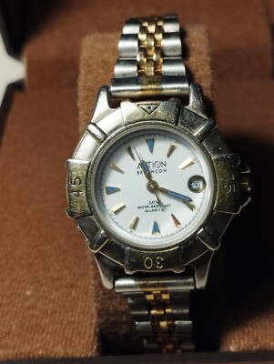 Montre ACTION Besançon femme quartz avec dateur pile incluse bracelet neuf 