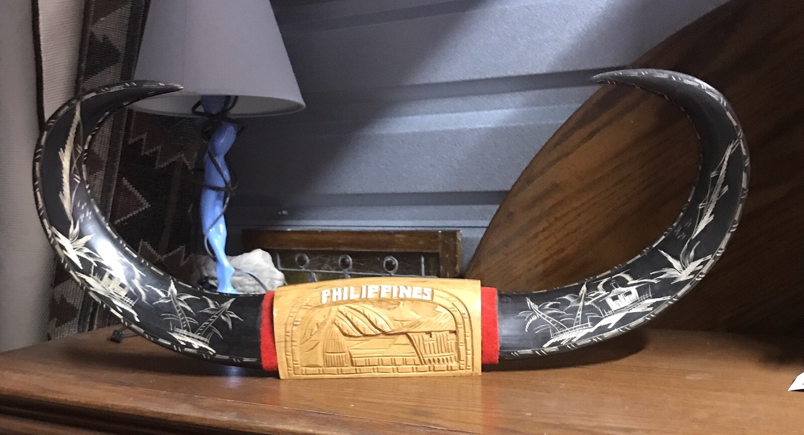 Philippines Water Buffalo Carved Horns on a Wood Base 33” wide/17” High