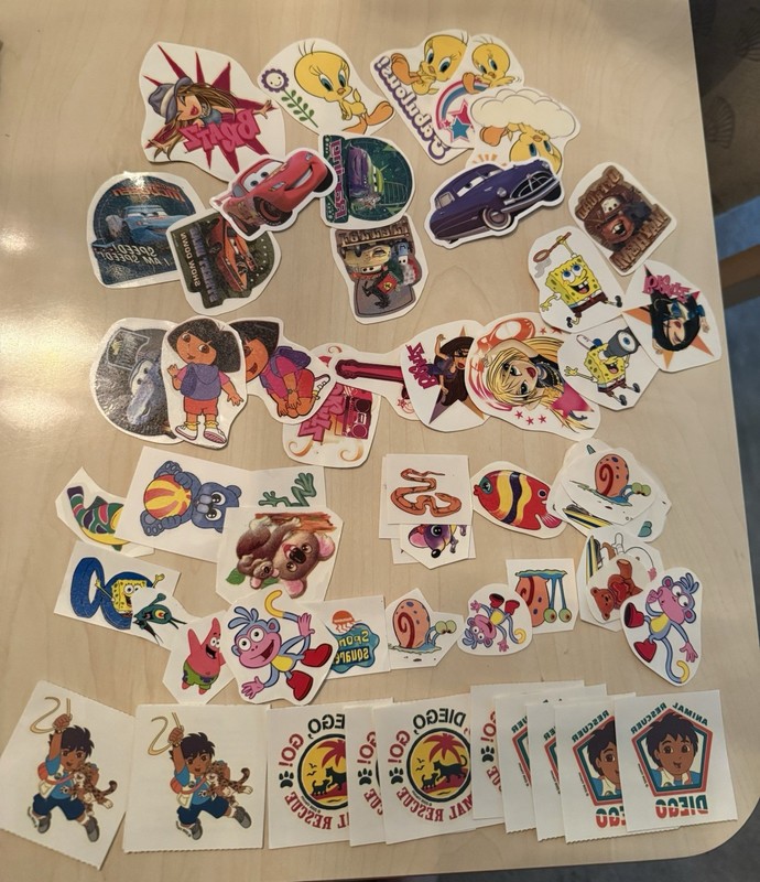 HUGE LOT OF EARLY 2000S TEMPORARY TATTOOS TWEETIE BIRD CARS DORA BRATZ!