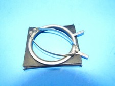 unique small filter holder marked RHACO DRP GERMANY attaches w/ spring clamps