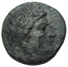 SELEUCID KINGDOM, AE 16, ANTIOCHOS II THEOS 261-246 BC. SARDES. APOLLO/ TRIPOD  