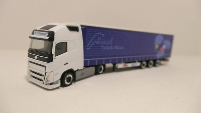 Herpa 1:87 - Volvo FH GL XL Megatrailer ''SFT Transport Rüssel Truck Show'' 954051