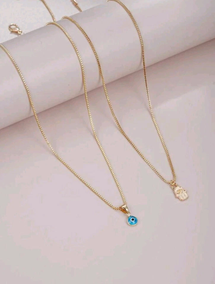 Juego de collar multicapa Hamsa enchapado en oro de 18k mano y mal de ojo Foto 2 de 4