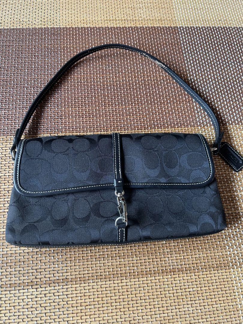 COACH Signature Shoulder Bag with Timeless Design and Luxury Details