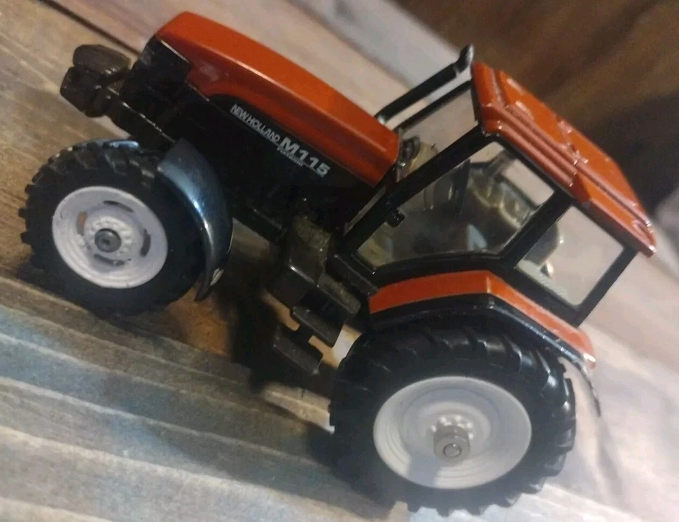Фермерская выставка игрушек New Holland M115 Fiatagri европейское издание 97 1:43 Нидерланды  - Изображение 2 из 4