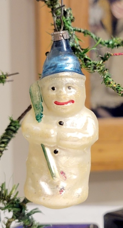 Winter Snowman, holding Green Broom.   Early 1900s German Glass Ornament