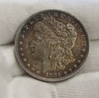 1881 O US Morgan Silver Dollar $1 AU Nice Toning