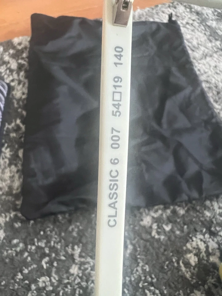 Gafas de sol Saint Laurent unisex redondas con montura blanca Foto 4 de 4