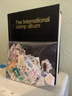 Worldwide Stamp Collection in Gibbons International Album Over 1600 Stamps