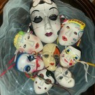 8 vintage Venetian masks.
