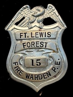 US ARMY FORT LEWIS FOREST FIRE WARDEN BADGE obsolete and rare