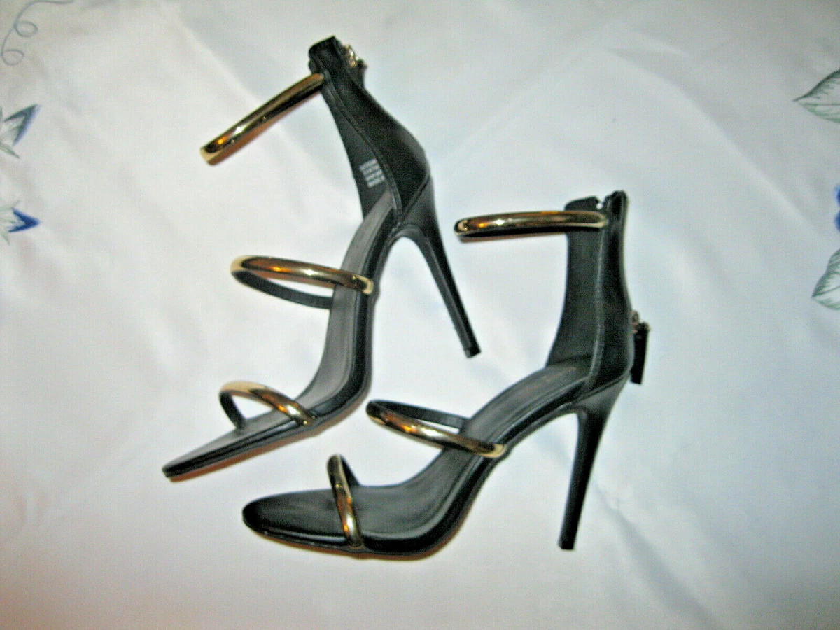 Bebe Berdine Stiletto Sandals 7 High Heel Black w Gold Strap NWOB Excellent