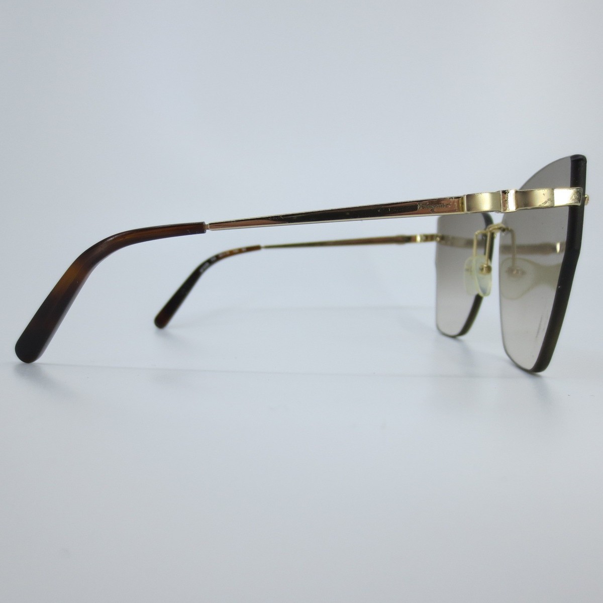 Salvatore Ferragamo Sunglasses with Gold Gancini Detail Sunglasses FERRAGAMO SF 964 S 003 Black/Gancini at Amazon  main image 2