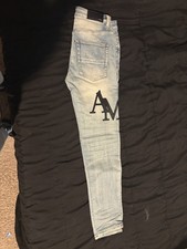AMIRI Men s Light Wash Blue Denim Skinny Jeans Distressed Logo Graphic