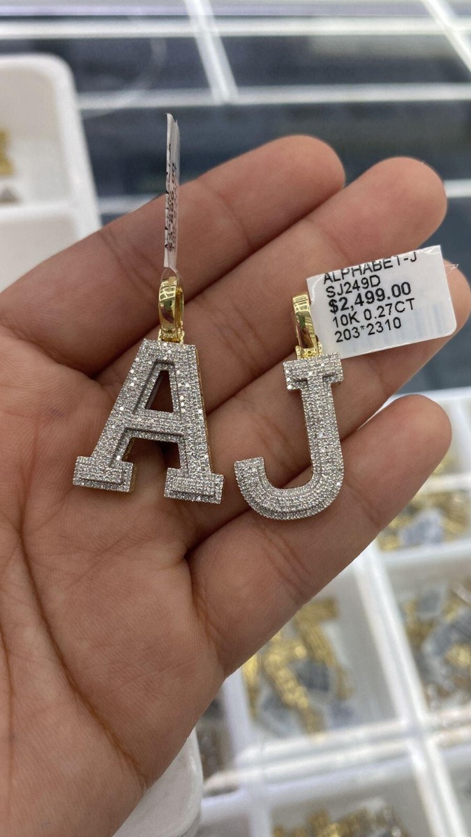 Custom made pendant A and J connected together 10k Yellow Gold