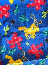 Western Fabric 1 Yard Plus 15 In, Cowboys With Lasso on Blue Backround