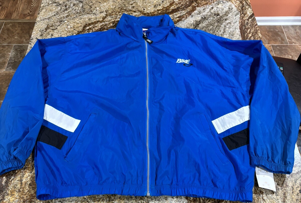 Bike Mens XXL Vtg 90s Windbreaker Nylon Jacket Blue Fold up hood