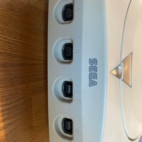 SEGA Dreamcast console with AV cable