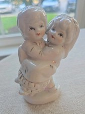 Vintage Groom Holding Bride Cake Topper Figurine