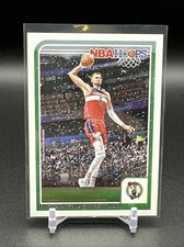 2023-24 NBA Hoops Kristaps Porzingis PURPLE WINTER PARALLEL HOLO SP Celtics #134