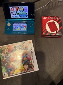 Nintendo 3DS Original Aqua Blue Teal System & Super Smash Brothers Game Charger