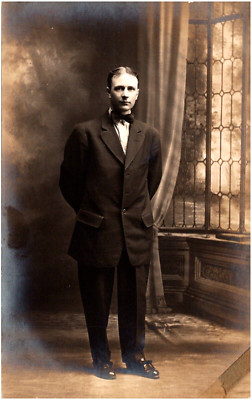 Dapper Man in Baggy Suit Studio Portrait 1910s RPPC Postcard Antique Photo
