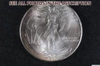 NobleSpirit GEM BU 1986 American SILVER Eagle .999 Fine Some Toning
