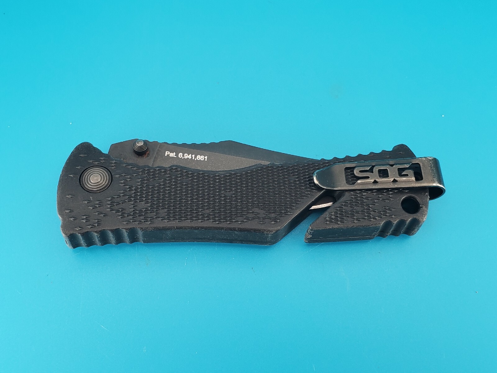 SOG TRIDENT Spring assisted Pocket Knife Button SAFETY Lock Belt Cutter!