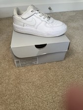 Nike Kids All-White Sneakers, Classic Nike sneakers for kids. All-white design.