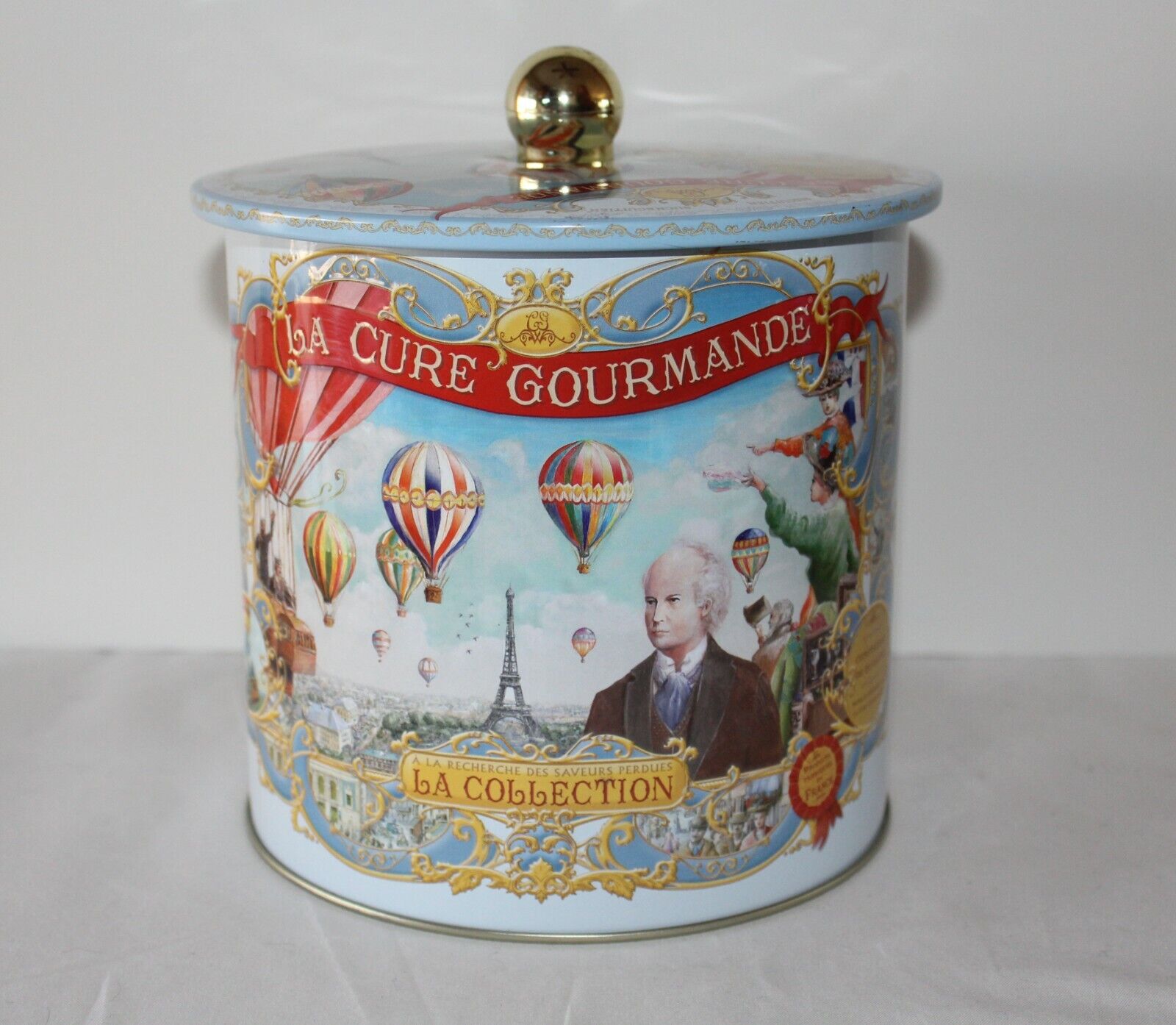 LA CURE GOURMANDE FRENCH BISCUIT TIN - HOT AIR BALLOON FRENCH SCENE