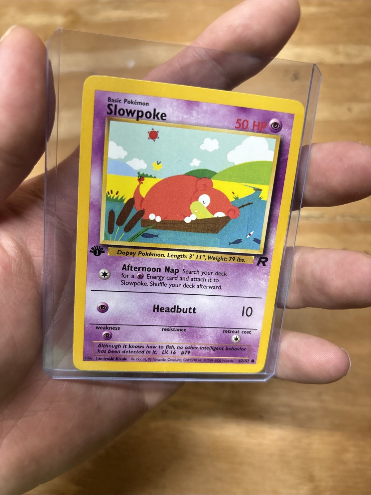 1st Edition Team Rocket Slowpoke 67/82 Pokemon Card LP