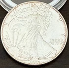 1987 American Silver Liberty Eagle - .999 / 1 Troy Ounce Unc. Toned Coin w/ Case