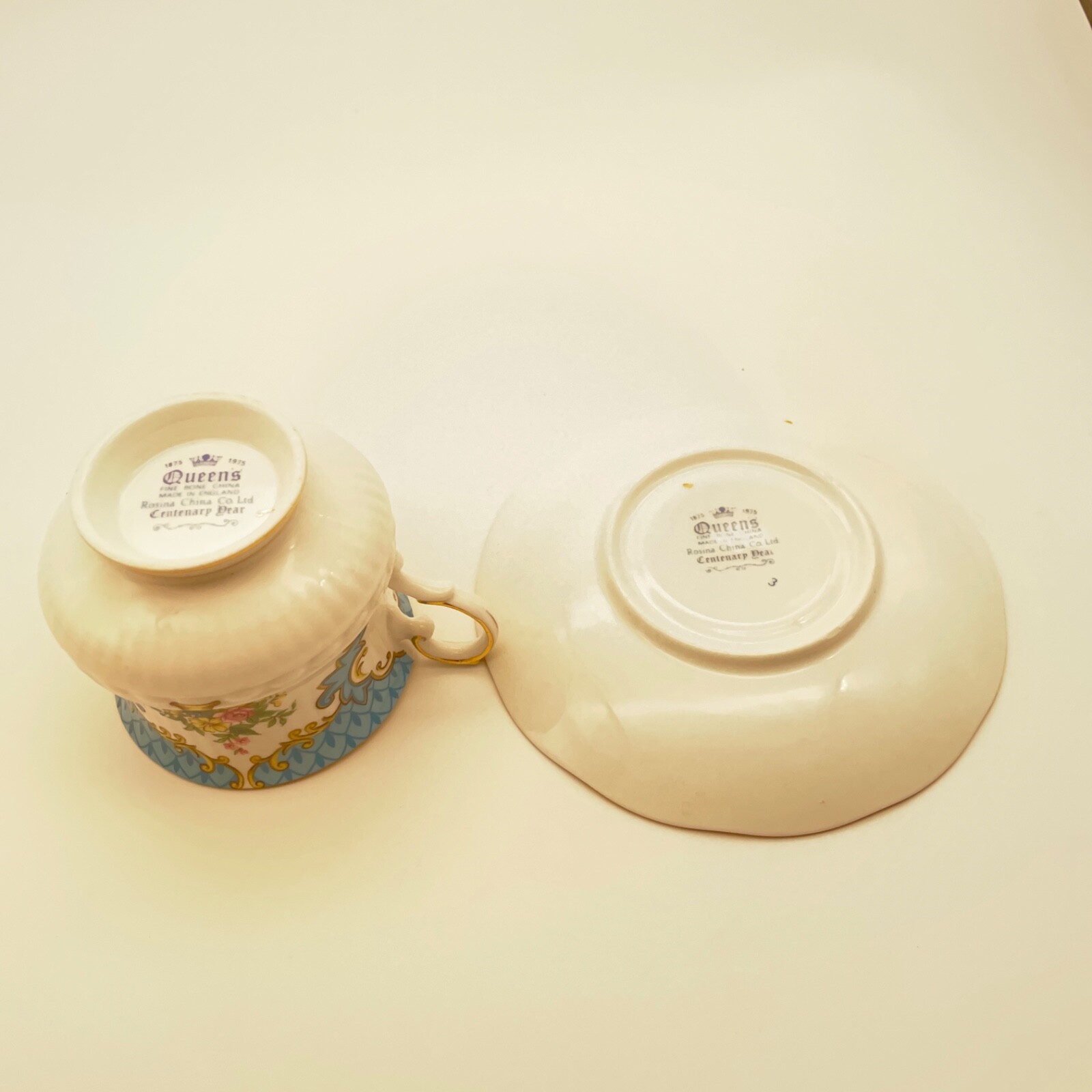 Rosina Tea Cup And Saucer Queens Centenary Dear Blue and Multi Bone