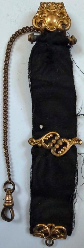 Watch fob: Gold, mourning grosgrain, 5"x15/16", seal missing (Lot#247)