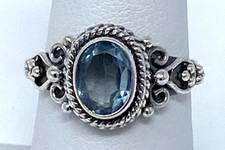 Elegant 1.92cts Faceted Natural Blue Topaz Oval Sterling Silver Ring Size 7