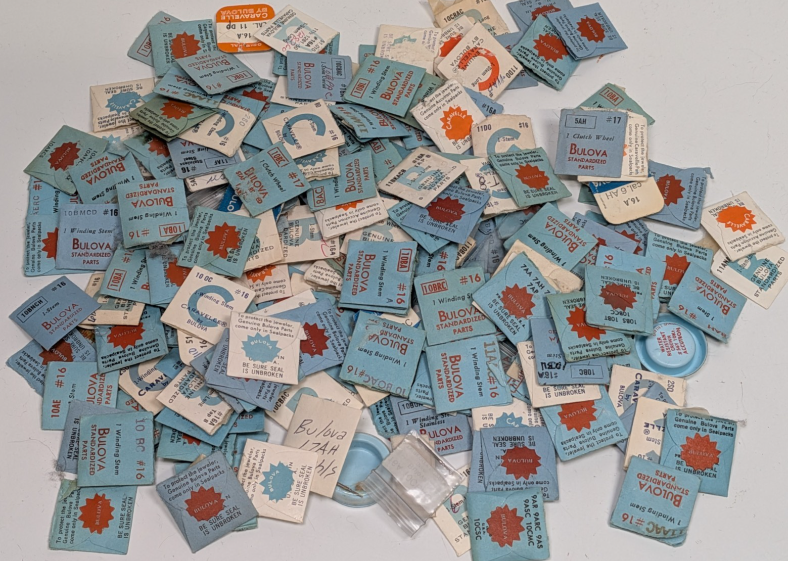 Lof of 200+ NOS NEW Genuine Bulova Watch Stems / Parts - Open Packs