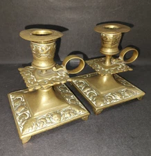 2 Brass Ornate Candlestick Holders Footed Finger Loop Fleur De Lis Foliage Face