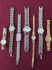 7 used women's watches, need batteries. Seiko, Geneva, Time Zone, Citizen, etc
