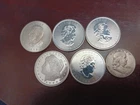 5 - 1 Troy Oz Silver Coins. 4 Canadian, 1 US, & 1954 Franklin Half Dollar Lot