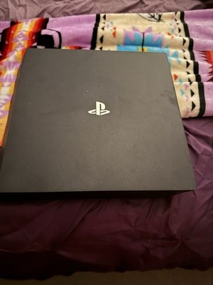 Sony PlayStation 4 Pro 1TB console also Extra Controller And Headset