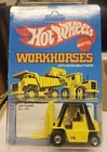 Hot Wheels 1979 Vintage 80s CAT Forklift #1168 Workhorses. Unpunched card.