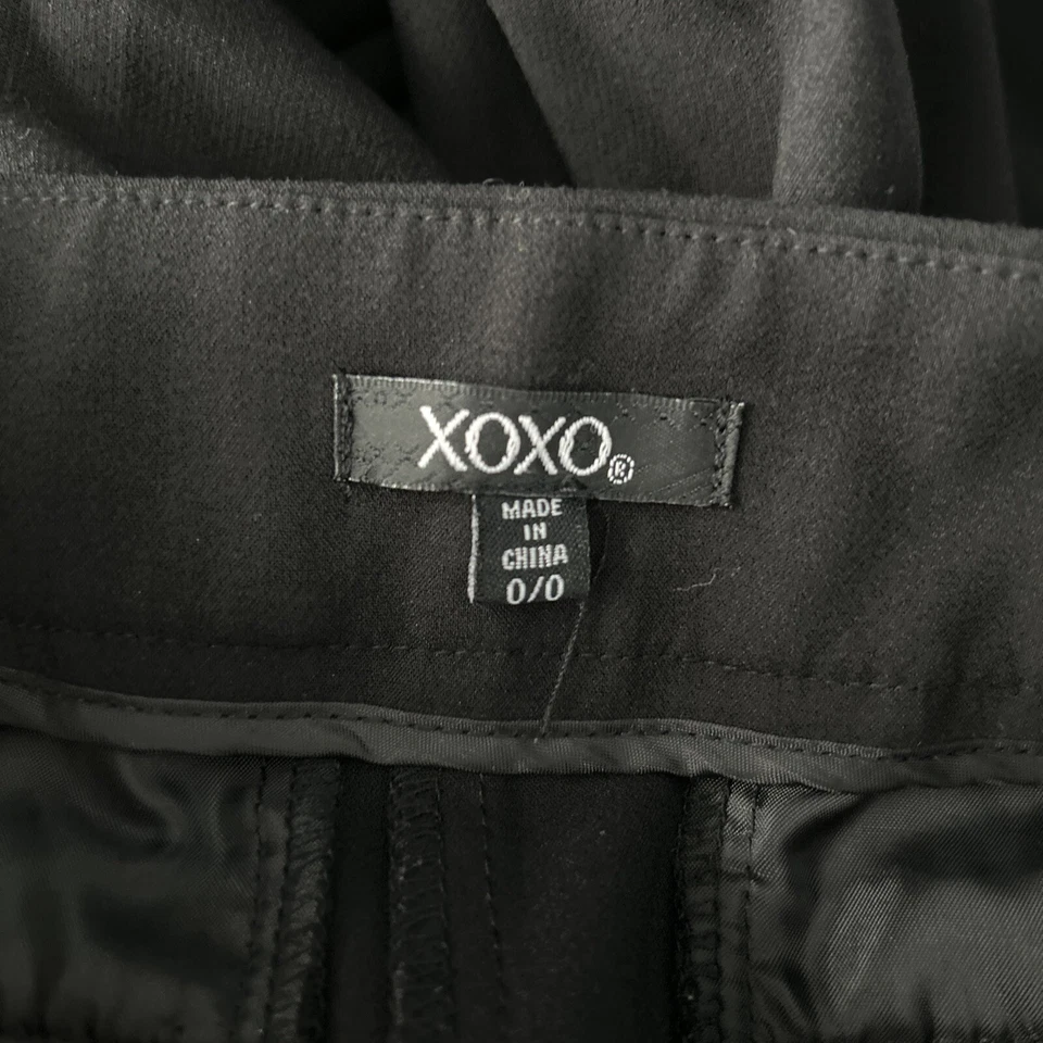 Pantalones acampanados XOXO Y2K para mujer talla O Bellbottoms negros elásticos frente plano tiro bajo Foto 3 de 4