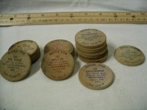 18 McDonald's Wooden Nickels and 2 McDonald Senior Customer Coupon Covers.